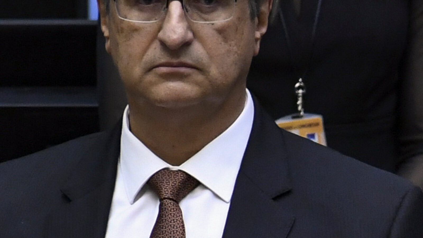 Paulo Gonet, procurador-geral da República, de terno, em evento oficial em Brasília